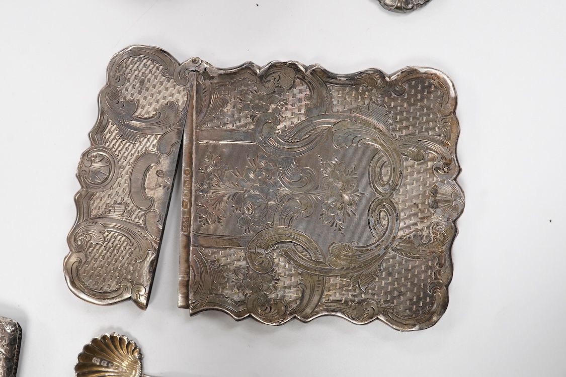 Small silver including a pair of Victorian provincial fiddle pattern sauce ladles, Robert Williams & Sons, Exeter, 1845, 16.6cm, a Victorian card case by Hilliard & Thomasson, two vesta cases, a sovereign case, a 1970's